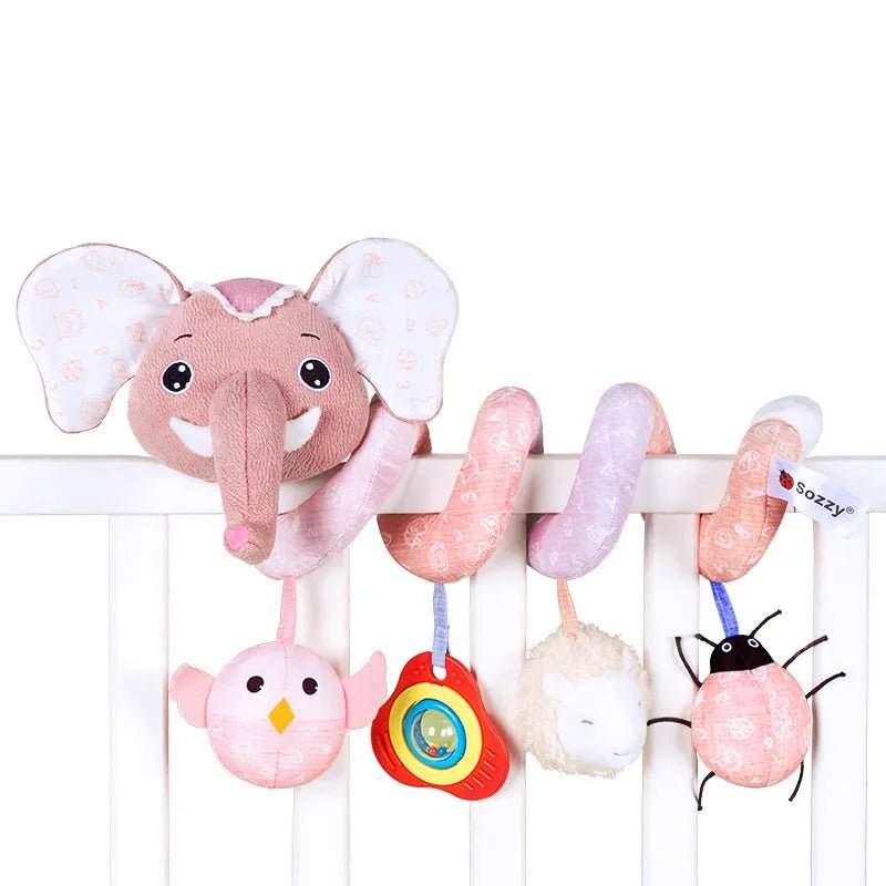 Infant car seat fox spiral musical toy with pink hanging elements for playtime.