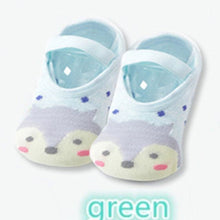 Infant cartoon grip socks in soft cotton for daily indoor wear and safe crawling.