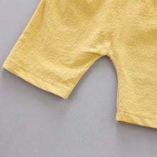 Yellow fabric on a gray background