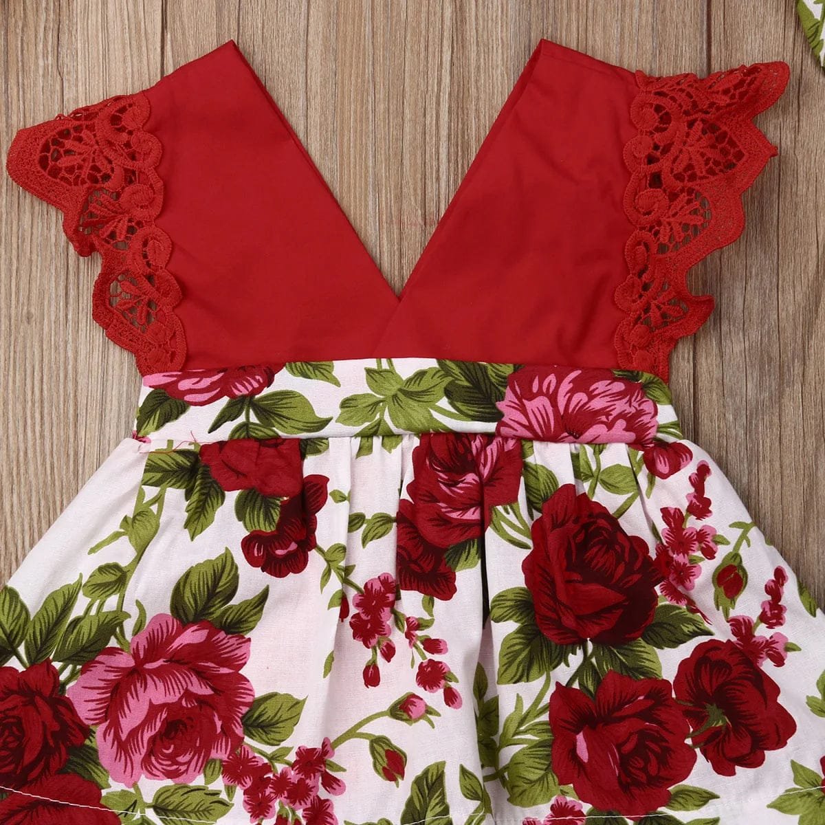 Red lace top and floral skirt princess outfit for infant summer wear and family celebrations.