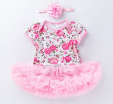 Floral baby outfit with pink tutu and matching headband