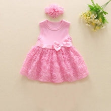 Pink dress with floral details and a matching headband (option 5)