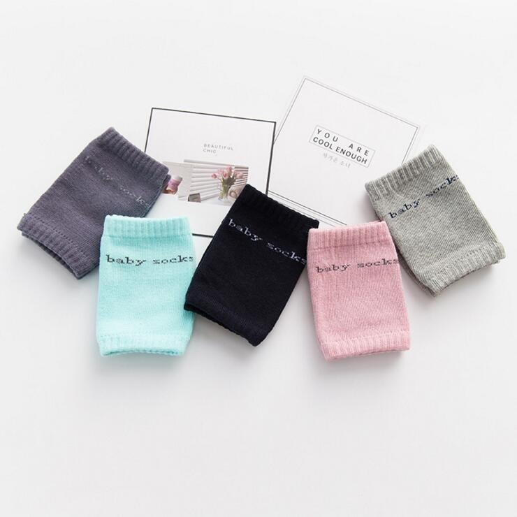 Five colour options of toddler knee pads for everyday crawling protection and easy rotation between washes.