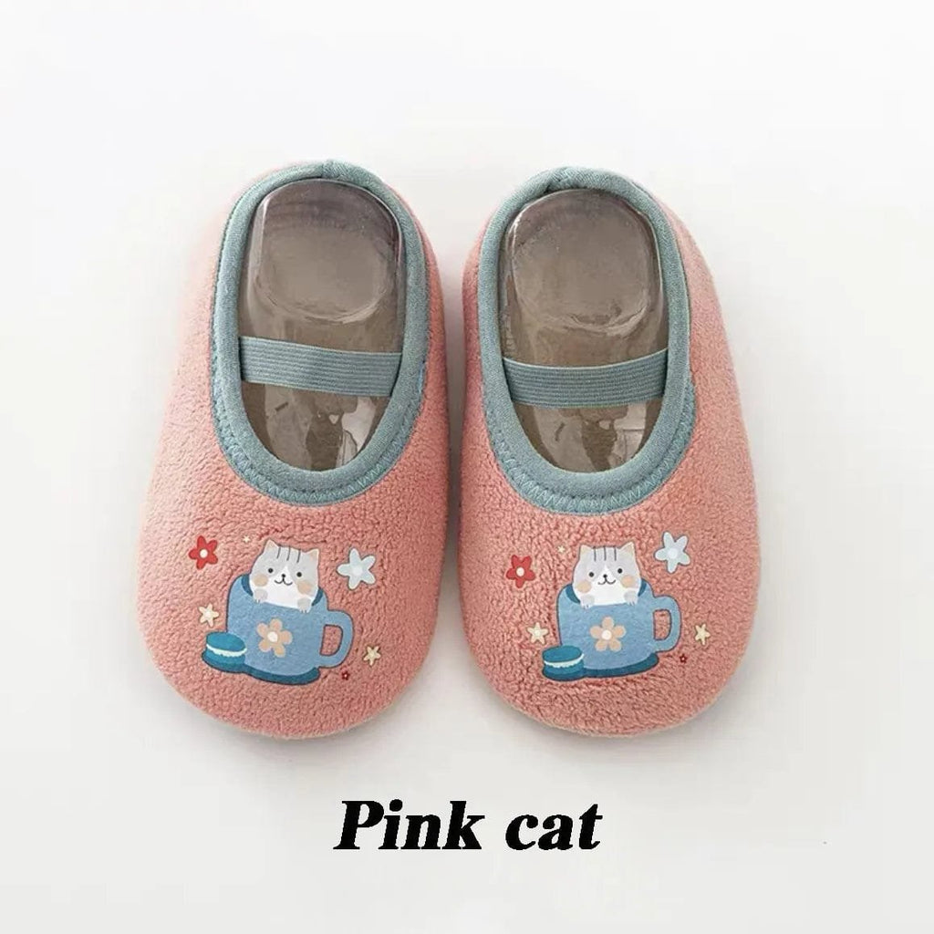 Infant non-slip socks sole texture detail for safer first steps on wooden and laminate floors.