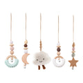 Set of hanging baby toys with clouds, moons, and stars.