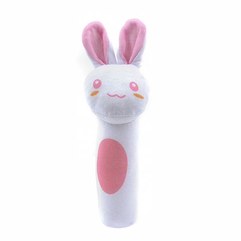 White plush toy with pink accents.