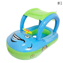 Infant water float with sunshade canopy and steering wheel in blue and green for shaded outdoor swimming sessions.