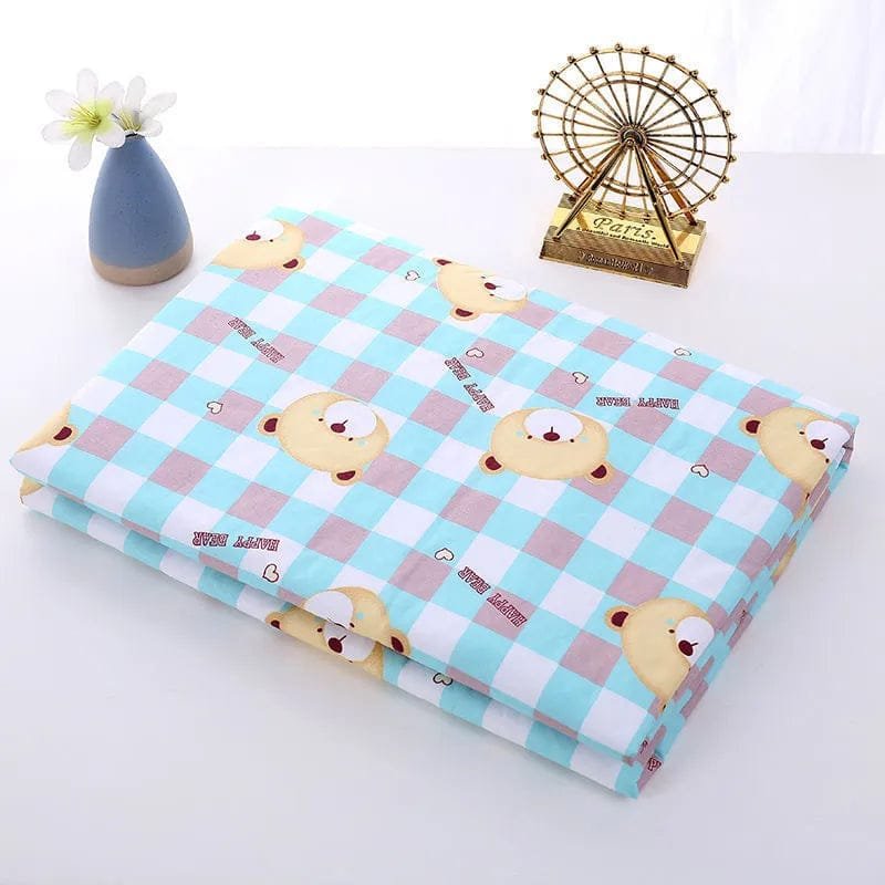 Checkered fabric with cartoon bear design on a white surface