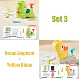 Set of green elephant and yellow hippo bath toys with packaging.