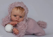 Joleen reborn doll kit in a pink hooded outfit for doll crafting projects and lifelike display.