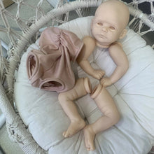 Joleen reborn doll kit with pink outfit for DIY doll crafting, painting and collectible display.