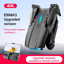 K3/E99 foldable drone smartphone holder with remote control for augmented reality FPV flying and gaming.