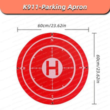 Red drone landing pad marker for K911 SE outdoor flying sessions, protecting propellers during takeoff and landing.