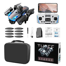 K911 SE drone full kit with remote control, spare propellers, and carrying case for travel-ready flying and gifting.