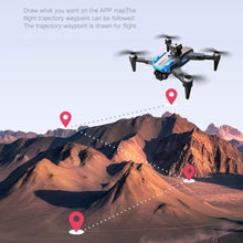K911 SE GPS drone flying a waypoint route over mountains for landscape aerial filming and travel videography.