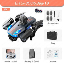 K911 SE foldable drone with arms folded beside its accessories for compact storage and quick outdoor setup.