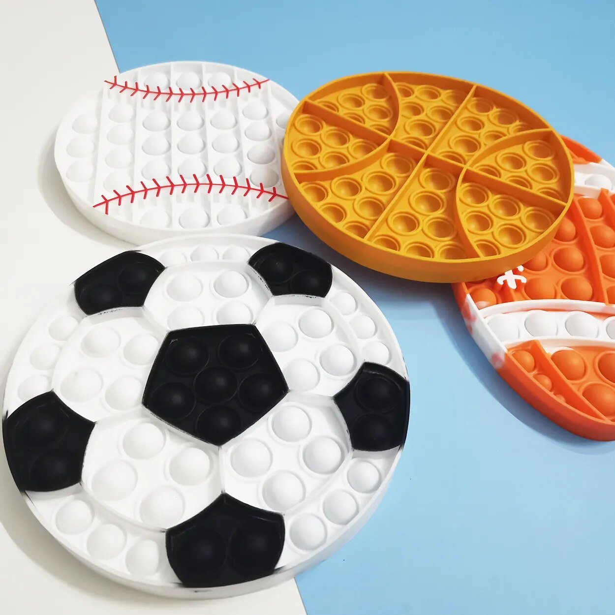 Kawaii Animal Fidget Toy set in soccer ball, basketball, baseball, and tennis racket shapes for sports-themed sensory play.