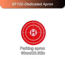 Red helipad landing pad with H marker for KF102 drone takeoffs and clean landings on grass or sand.