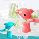 Two bubble-making toys shaped like dolphins, one pink and one blue, with bubbles around them.