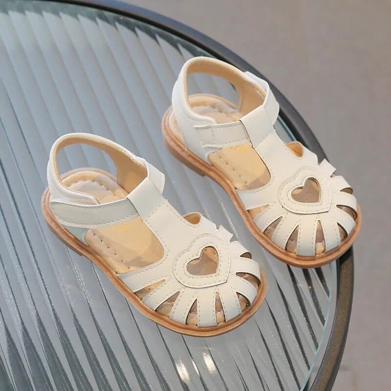 Fashion Soft Bottom Beach Sandals for Kids style D slip-on shoes for beach outings, poolside play, and summer walks, angle view.