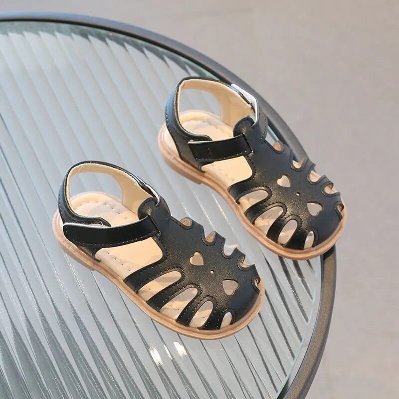 Fashion Soft Bottom Beach Sandals for Kids style H slip-on shoes for beach outings, poolside play, and summer walks, angle view.