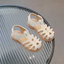 Fashion Soft Bottom Beach Sandals for Kids style K slip-on shoes for beach outings, poolside play, and summer walks, side view.