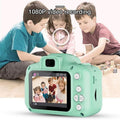 Waterproof Kids Cartoon Camera in green with 1080P HD screen for children capturing photos and videos outdoors.