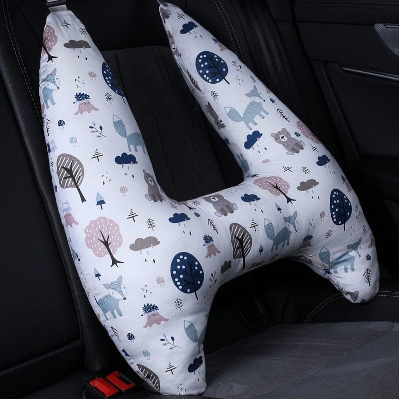 U-shaped car pillow with animal and nature pattern on a car seat