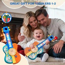 Parents and baby with blue and orange toy guitars under a great gift for toddlers banner