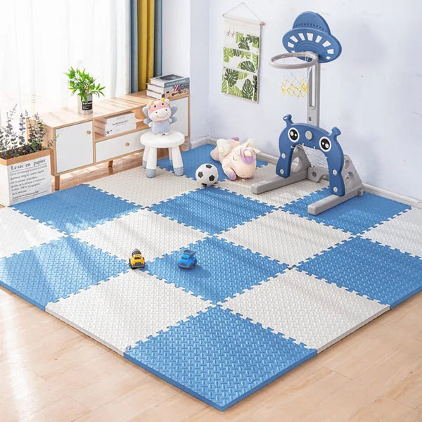 Kids Foam Puzzle Play Mat in blue and white checkered pattern covering a playroom floor for safe indoor play.