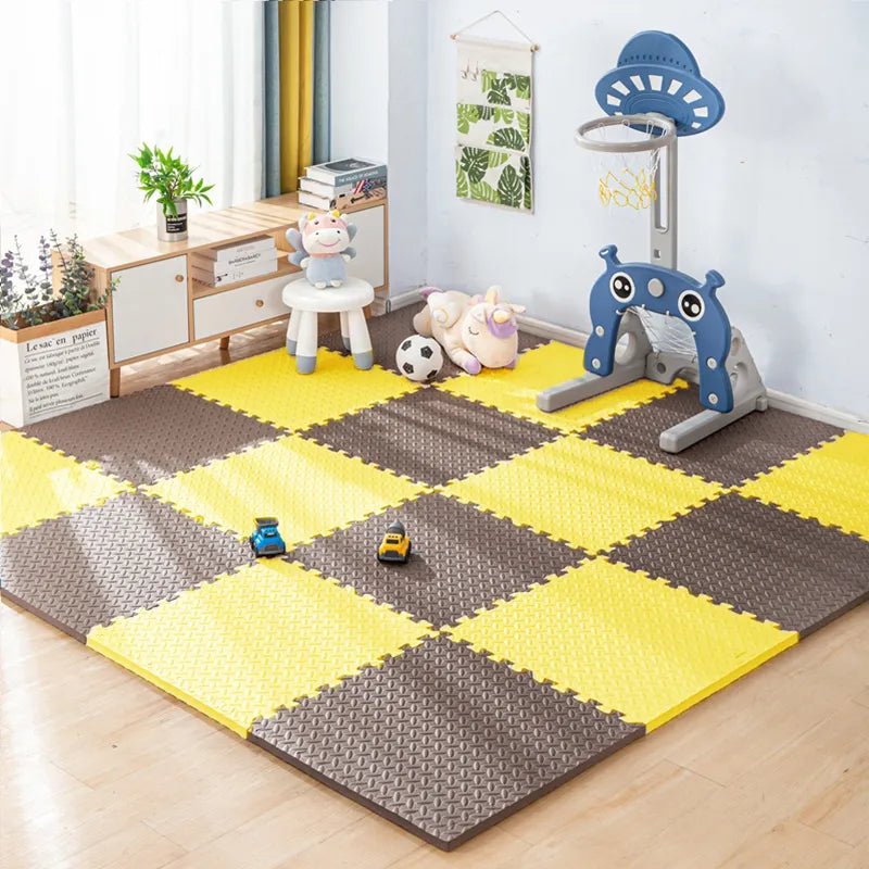 Kids Foam Puzzle Play Mat interlocking tiles set up in a playroom with a basketball hoop for kids' fun.