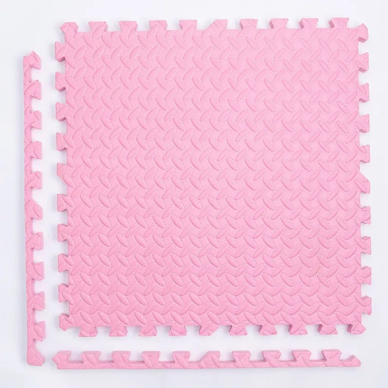 Kids Foam Puzzle Play Mat in pink interlocking tiles for exercise room floor padding.