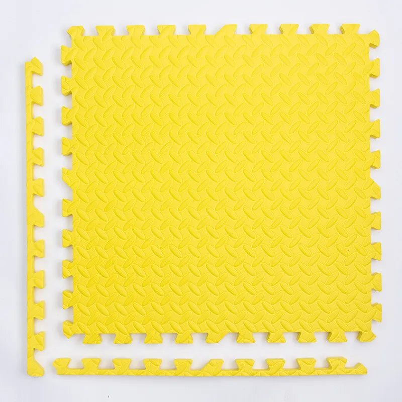 Kids Foam Puzzle Play Mat in yellow interlocking tiles for cushioned workout floor padding.