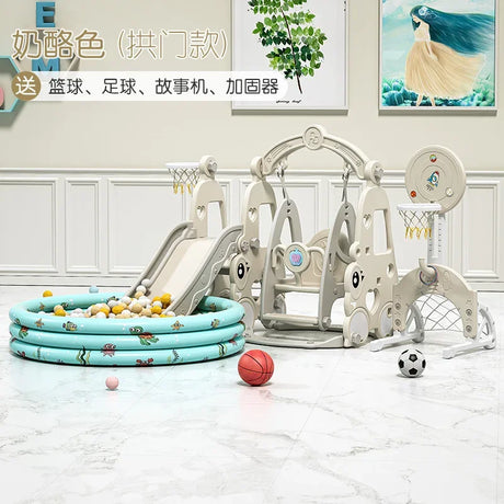 Children's play area with a slide, ball pit, and sports equipment on a marble floor.