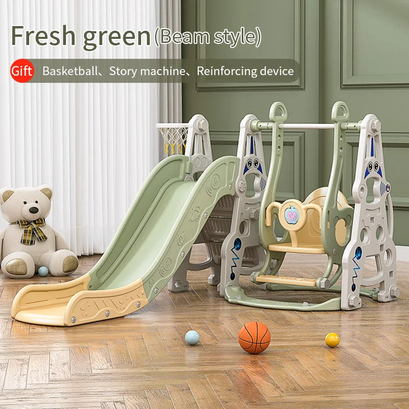 Children's play set with slide and swing on a wooden floor, featuring a teddy bear and sports balls.