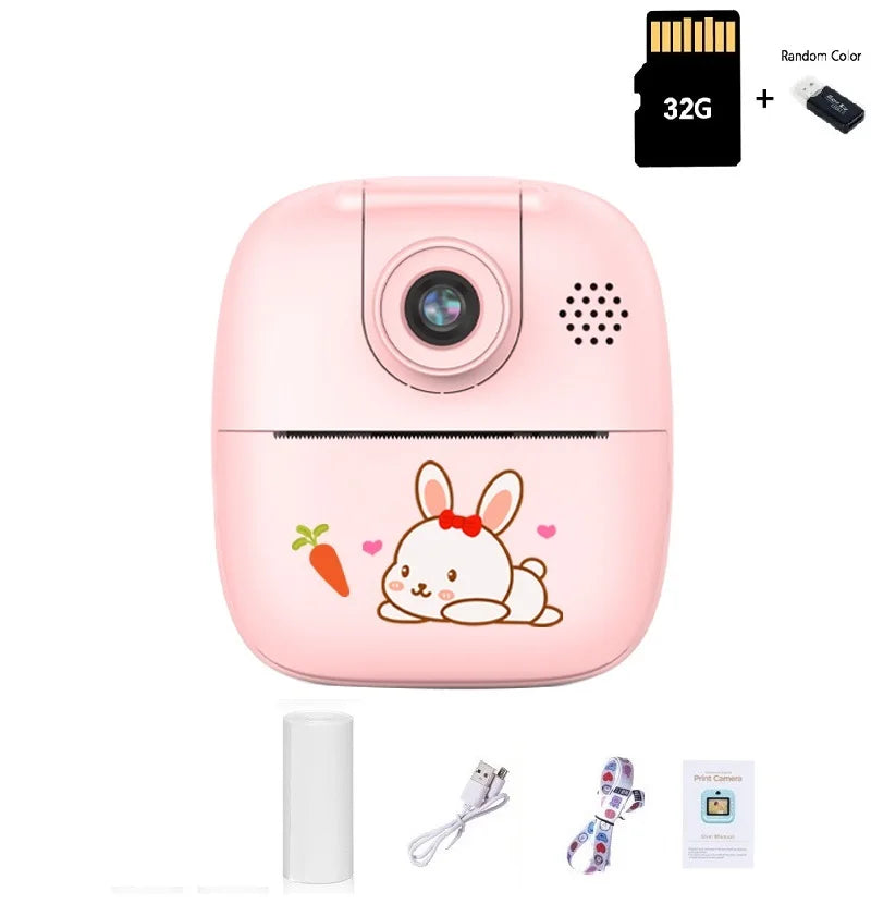 Pink bunny kids camera with a 32G memory card, one paper roll, USB cable, lanyard and manual