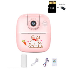 Pink bunny kids camera with a 32G memory card, one paper roll, USB cable, lanyard and manual
