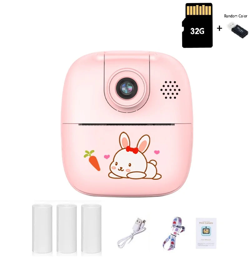 Pink bunny kids camera with a 32G memory card and card reader, three paper rolls, USB cable, lanyard and manual