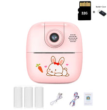 Pink bunny kids camera with a 32G memory card and card reader, three paper rolls, USB cable, lanyard and manual