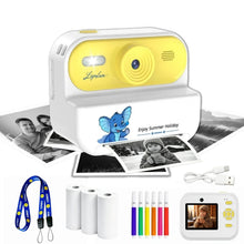 White and yellow instant print camera with a print, a lanyard, paper rolls, colored pens and a USB cable