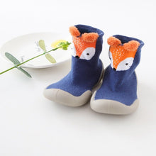 Pair of blue baby socks with fox design