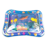 Inflatable water mat with ocean-themed design on a white background