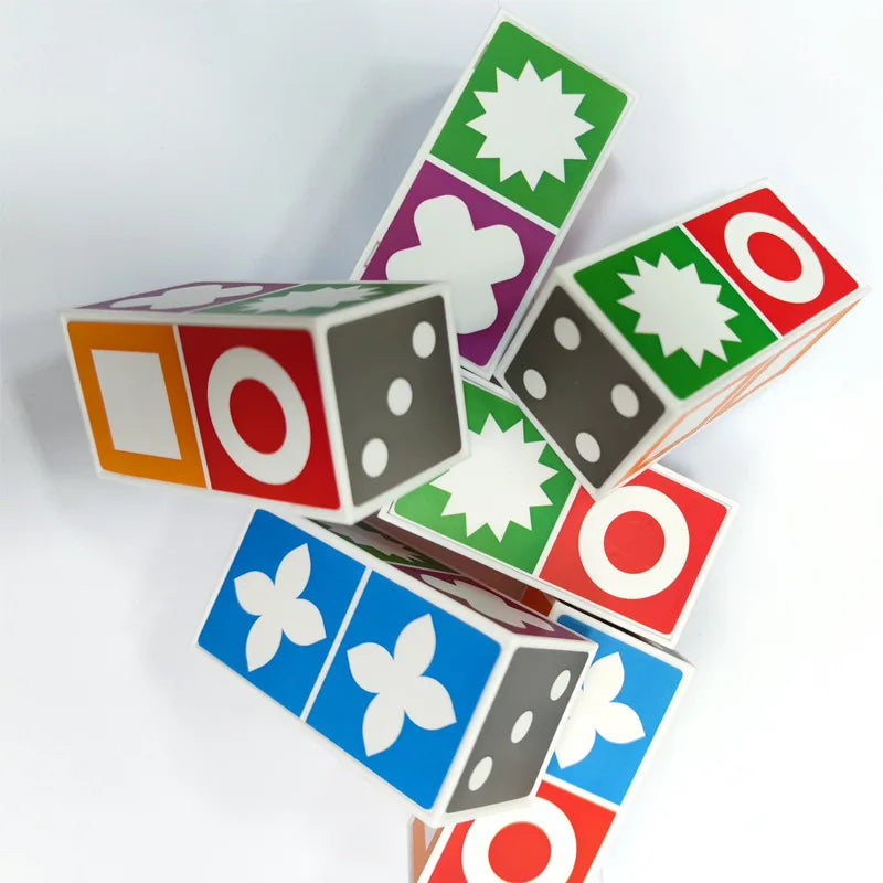 Close-up of colorful matching blocks with circles, squares, crosses, flowers and stars