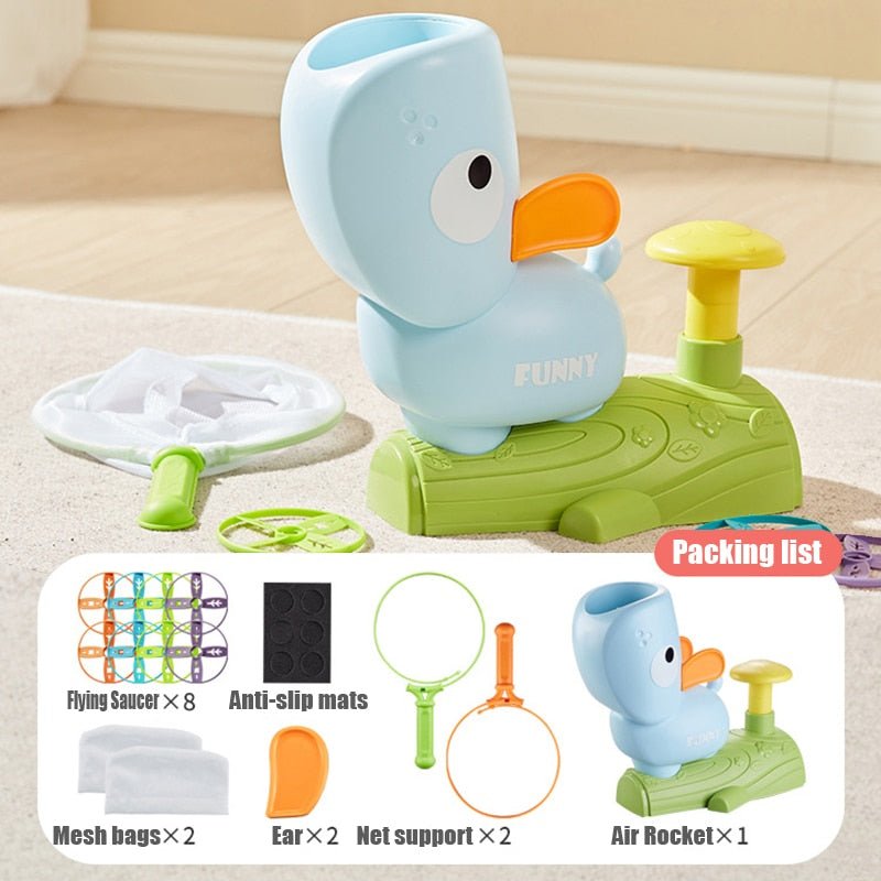 Toy duck with accessories on a beige surface