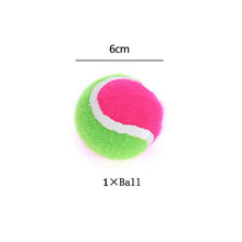Pink and green tennis ball with measurement label