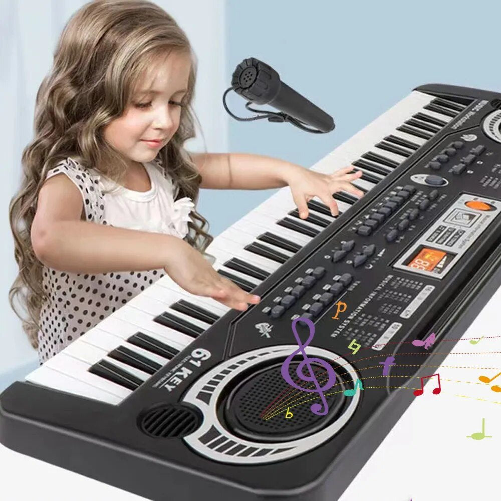 Child playing the kids piano keyboard with microphone on a light blue background for early music practice.
