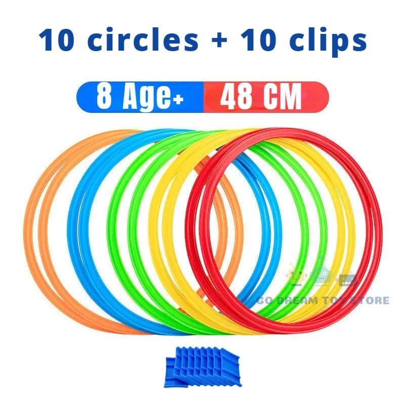 Set of colorful rings with a blue clip on a white background