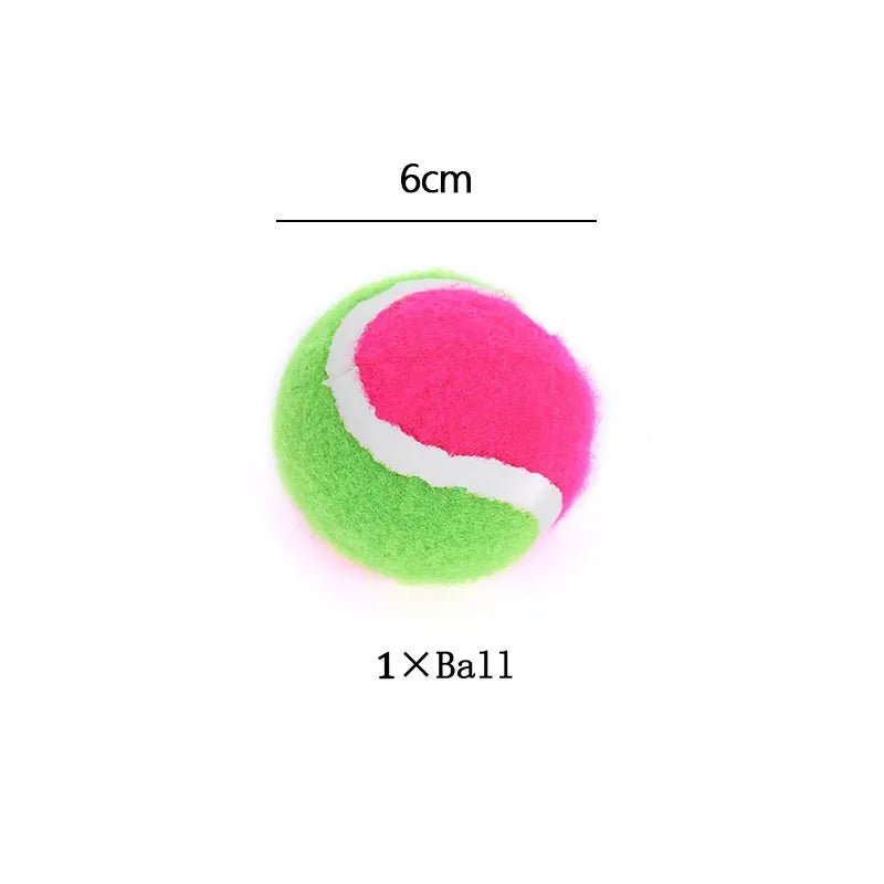 Pink and green tennis ball with measurement label.
