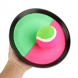 Colorful juggling ring with green and pink sections held by a hand