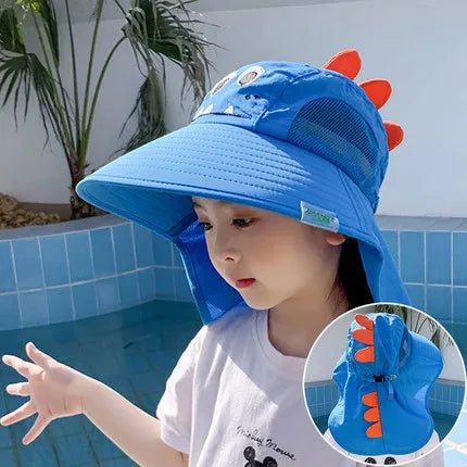 Child wearing a blue dinosaur-themed sun hat with a pool in the background